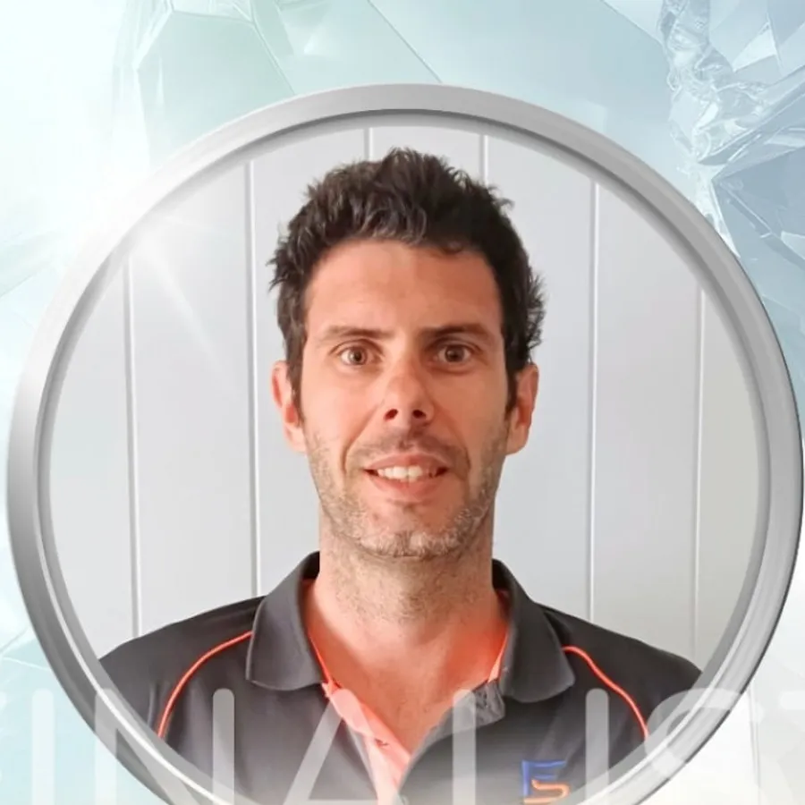 Jason Breingan, director and lead tradesperson at Flowtek Services, in the charcoal Flowtek polo with the orange collar